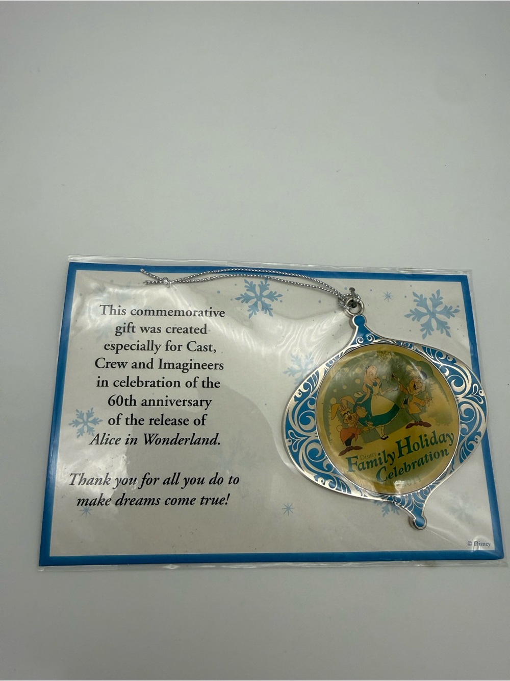 Disney Family Holiday Celebration Silver and Blue Alice in Wonderland Ornament